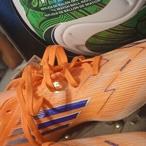 Orange and Blue Soccer Cleats